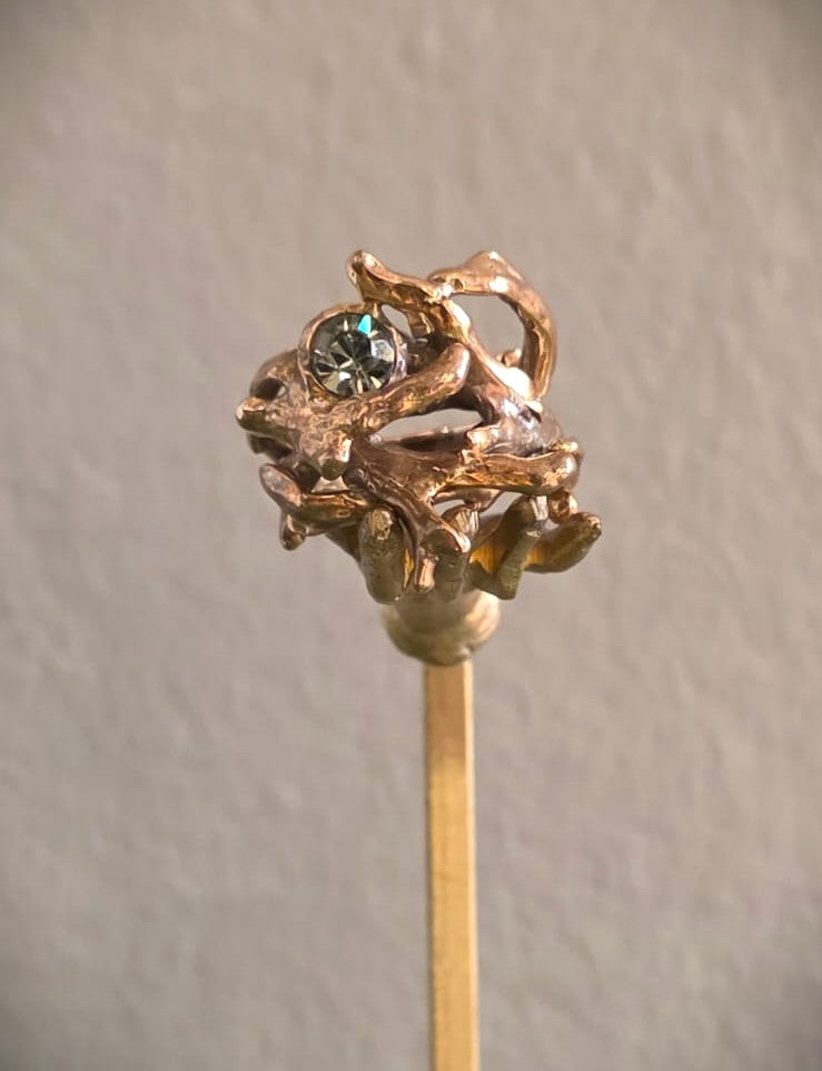 Anello "Nido" in bronzo giallo e zirconia verde