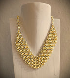 Choker in ottone dorato